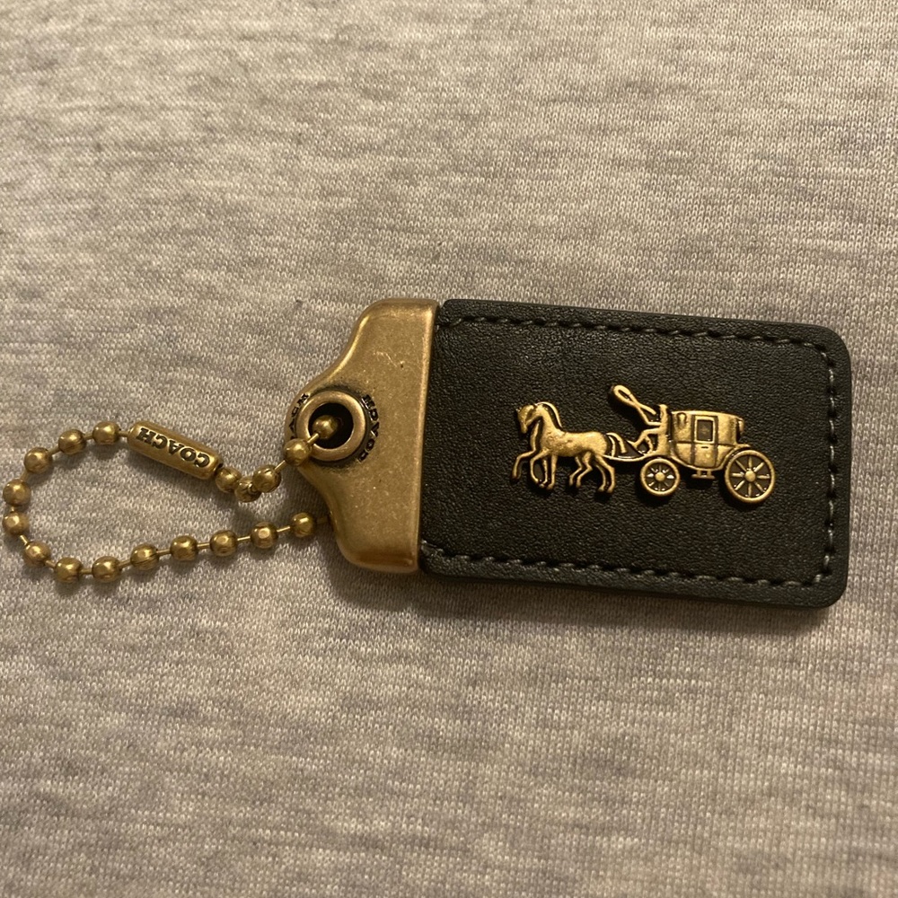 NEW COACH ROGUE Charm